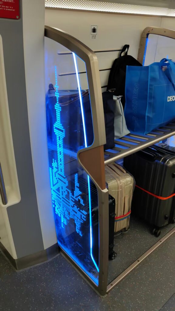 airport link line train inside luggage storage